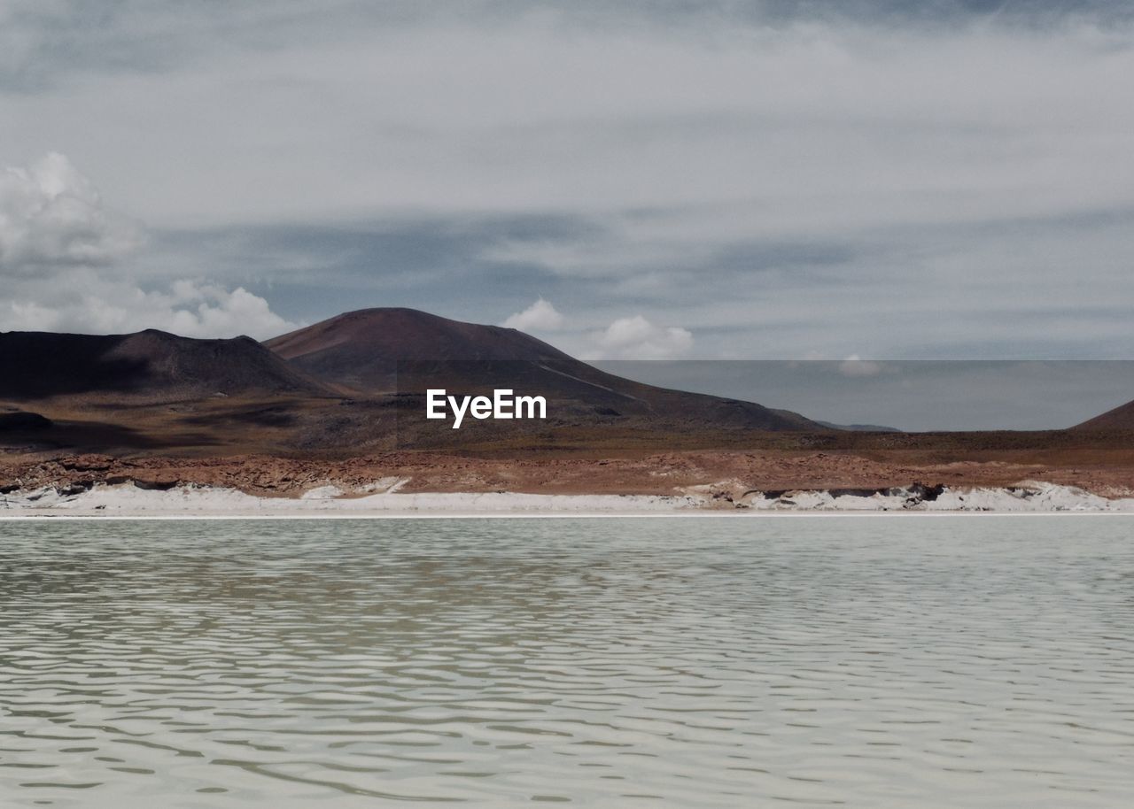 SCENIC VIEW OF MOUNTAIN AGAINST SKY