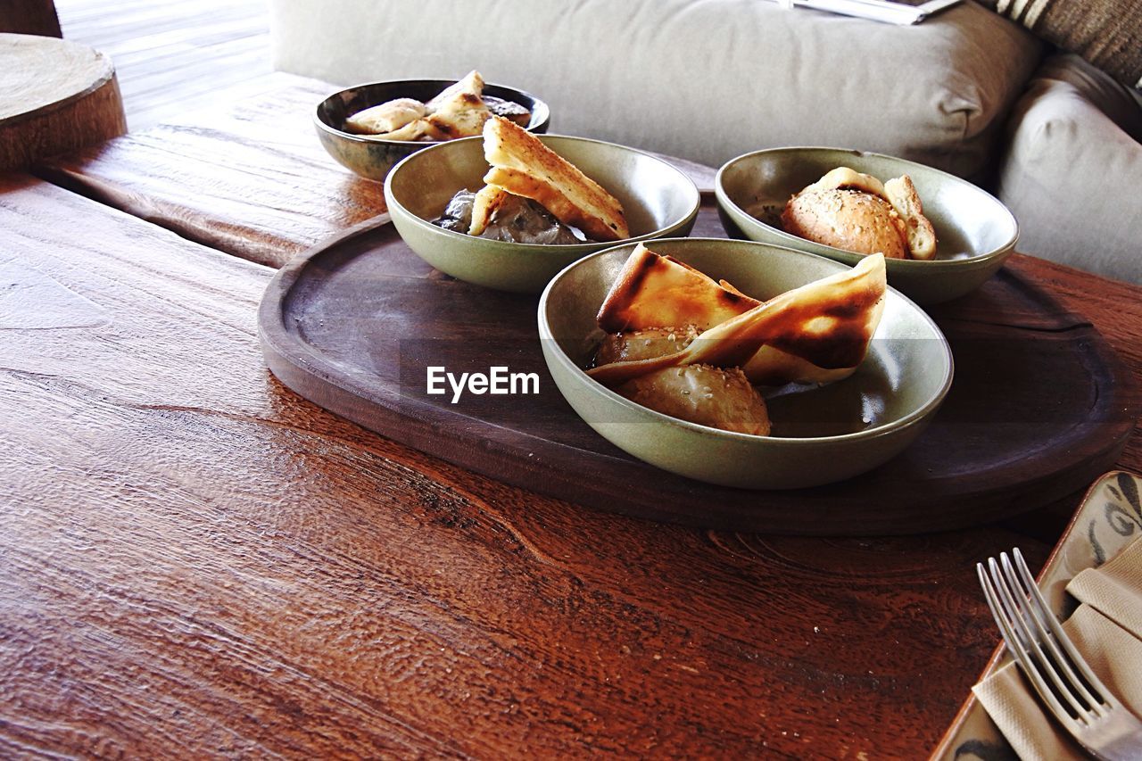 CLOSE-UP OF FOOD ON TABLE