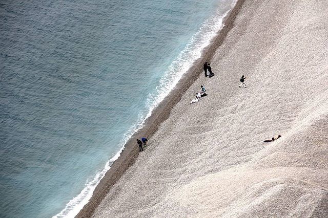 TOURISTS ON BEACH