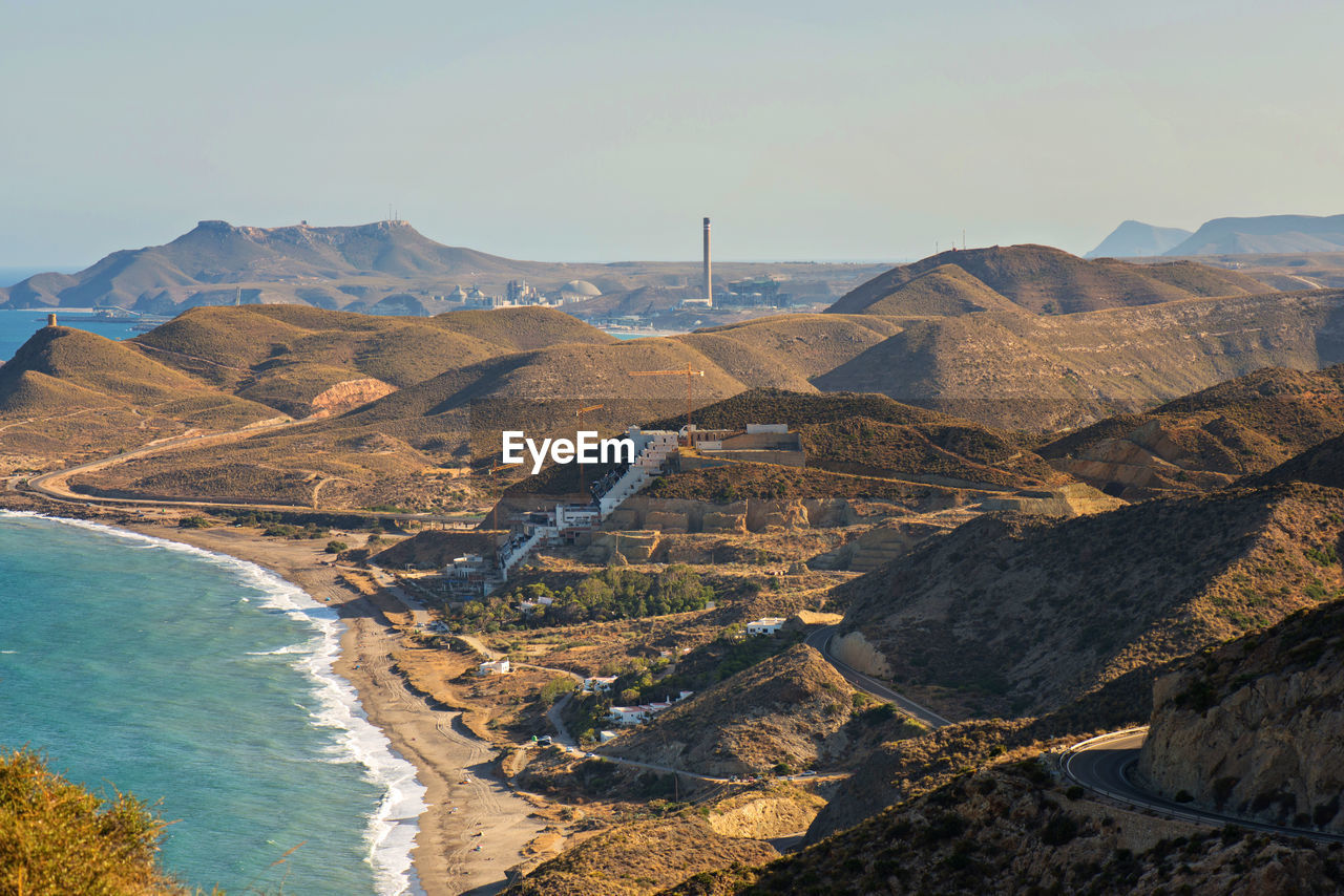 HIGH ANGLE VIEW OF LAND AGAINST SKY