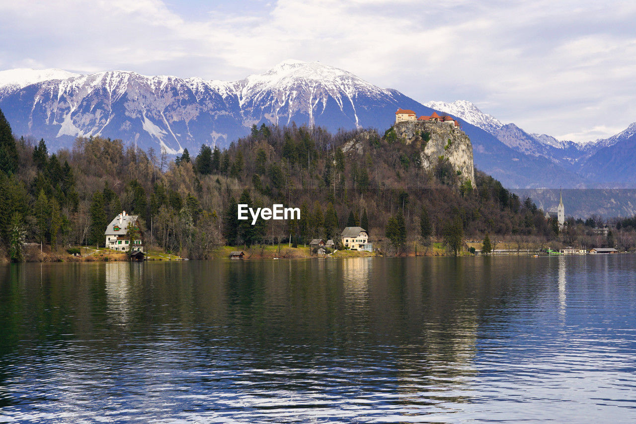 Scenic view of snowcapped mountains against sky on the bled lake