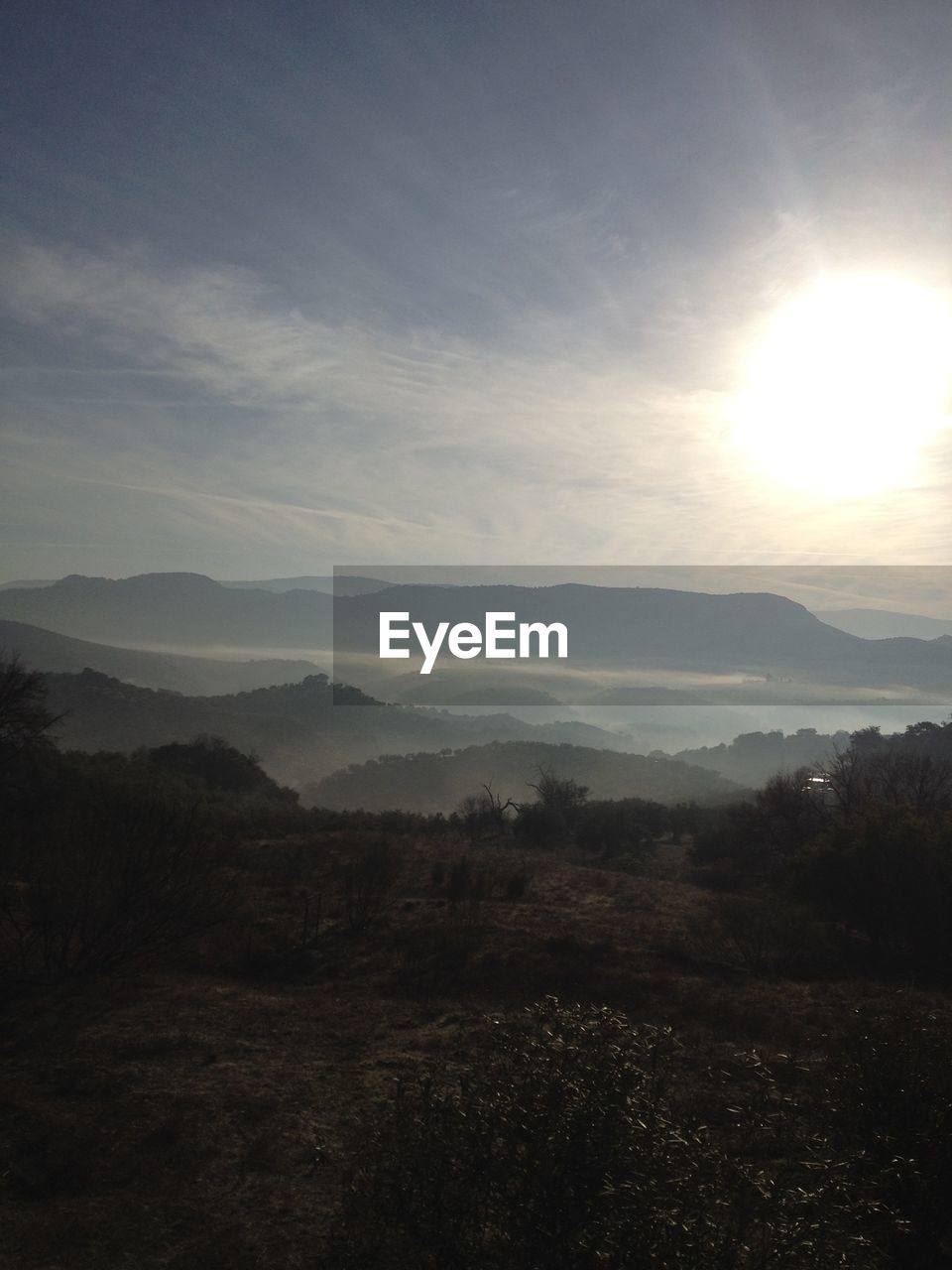 Scenic view of landscape against sky during sunset