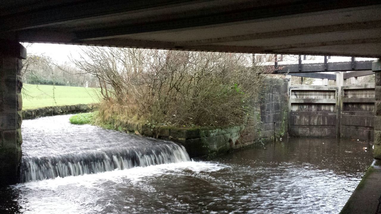 VIEW OF BRIDGE OVER RIVER