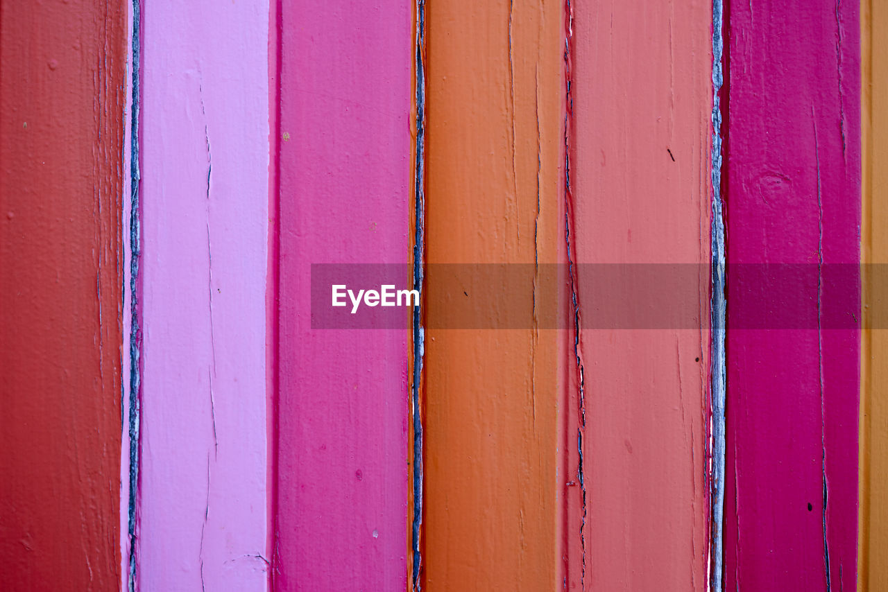 Full frame shot of multi colored wooden door 