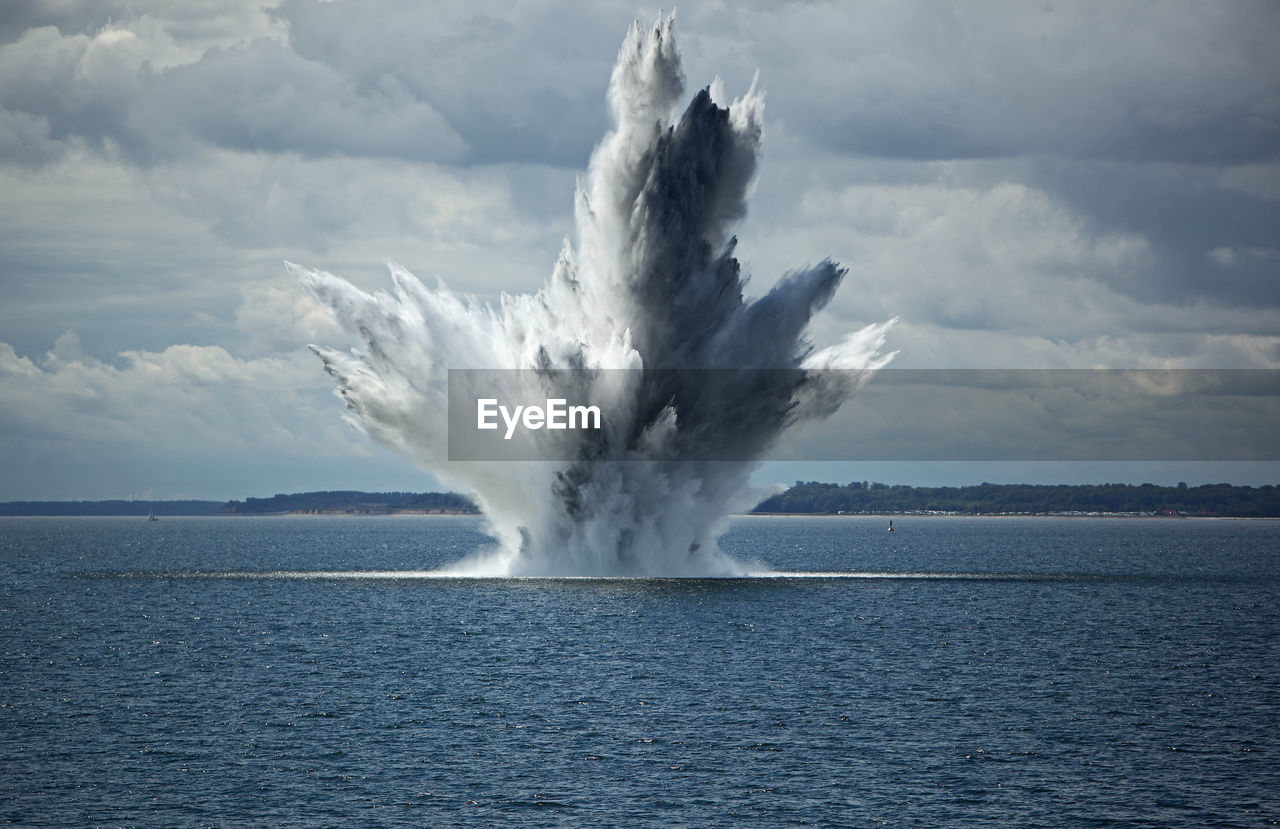 Huge water fountain caused by a below surface explosion of a sea mine