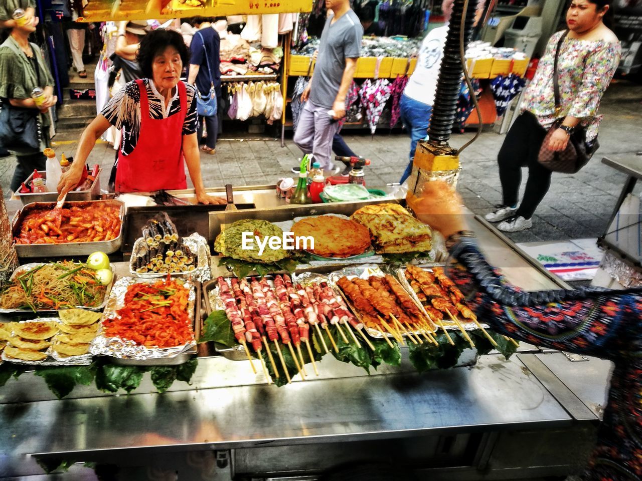 PEOPLE FOR SALE AT MARKET STALL