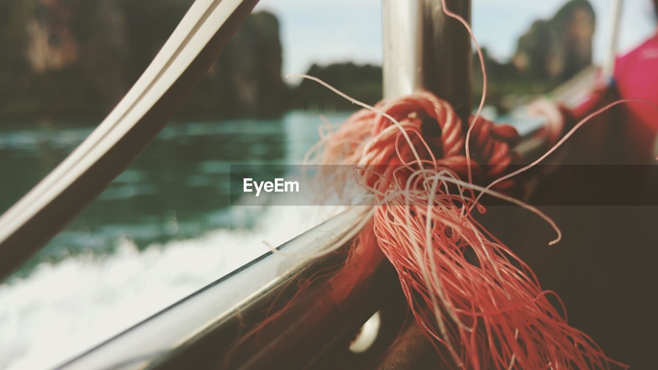 CLOSE-UP OF FISHING NET BOAT