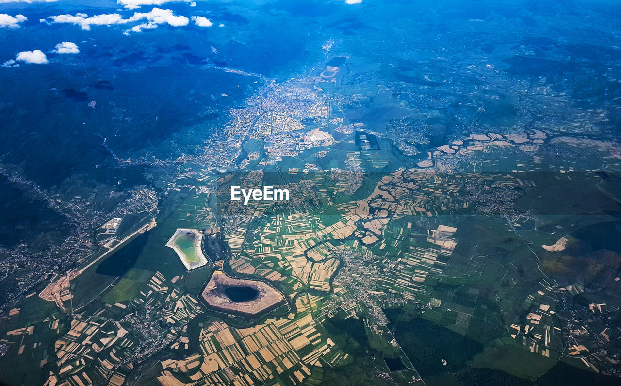 High angle view of cityscape by sea