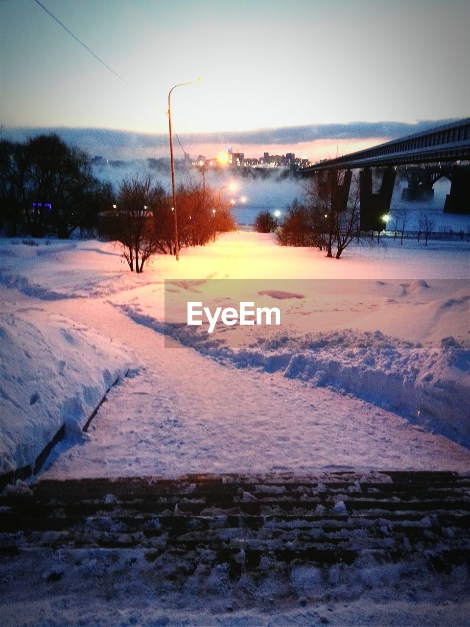 VIEW OF SNOW COVERED ROAD