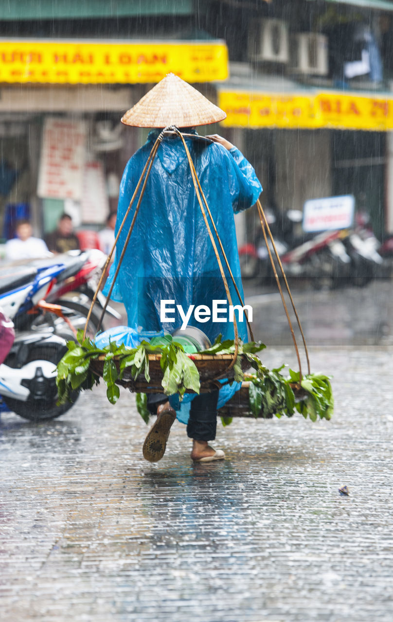 Street scene in hanoi during rainy season