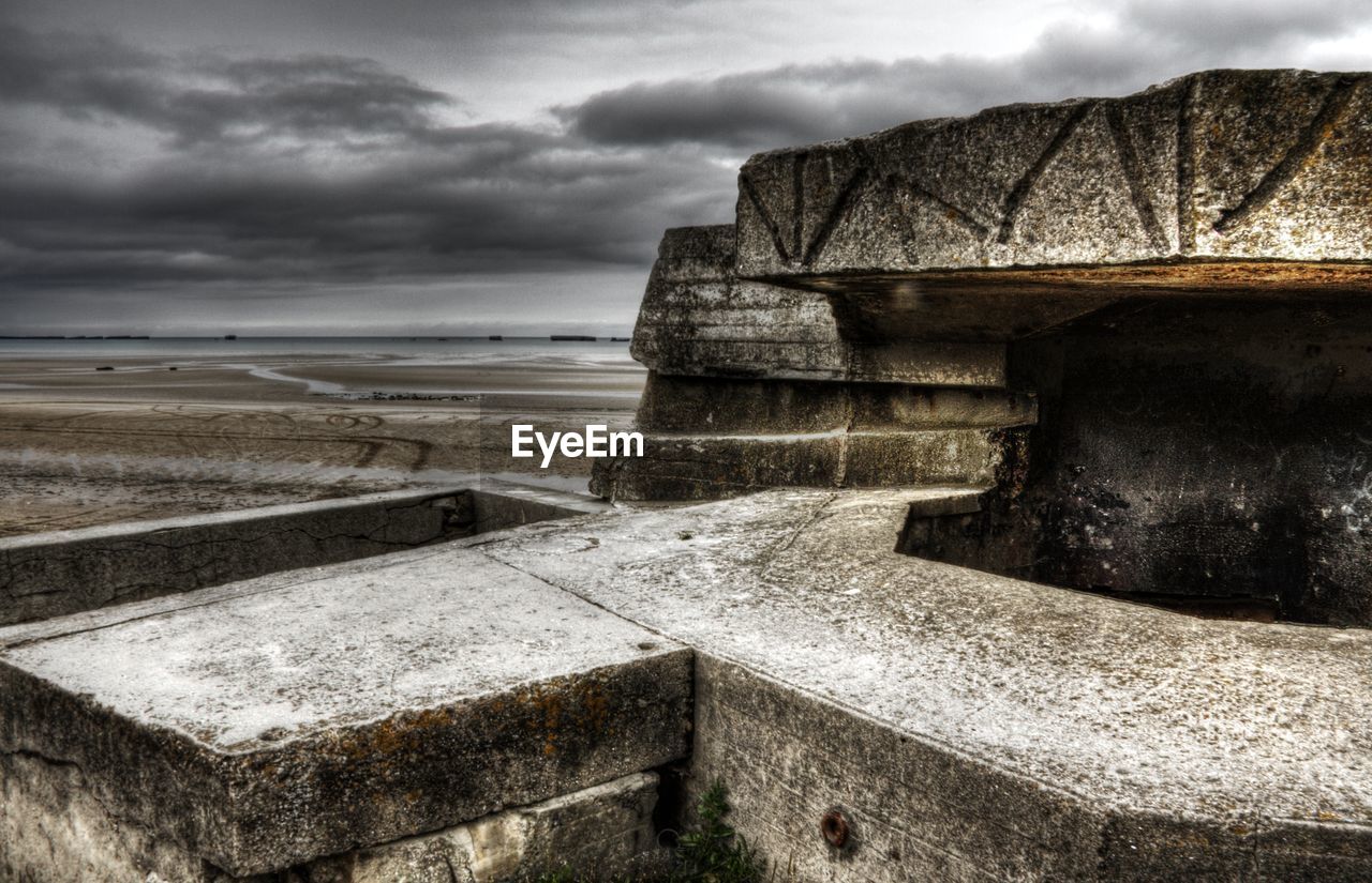 STONE WALL BY SEA