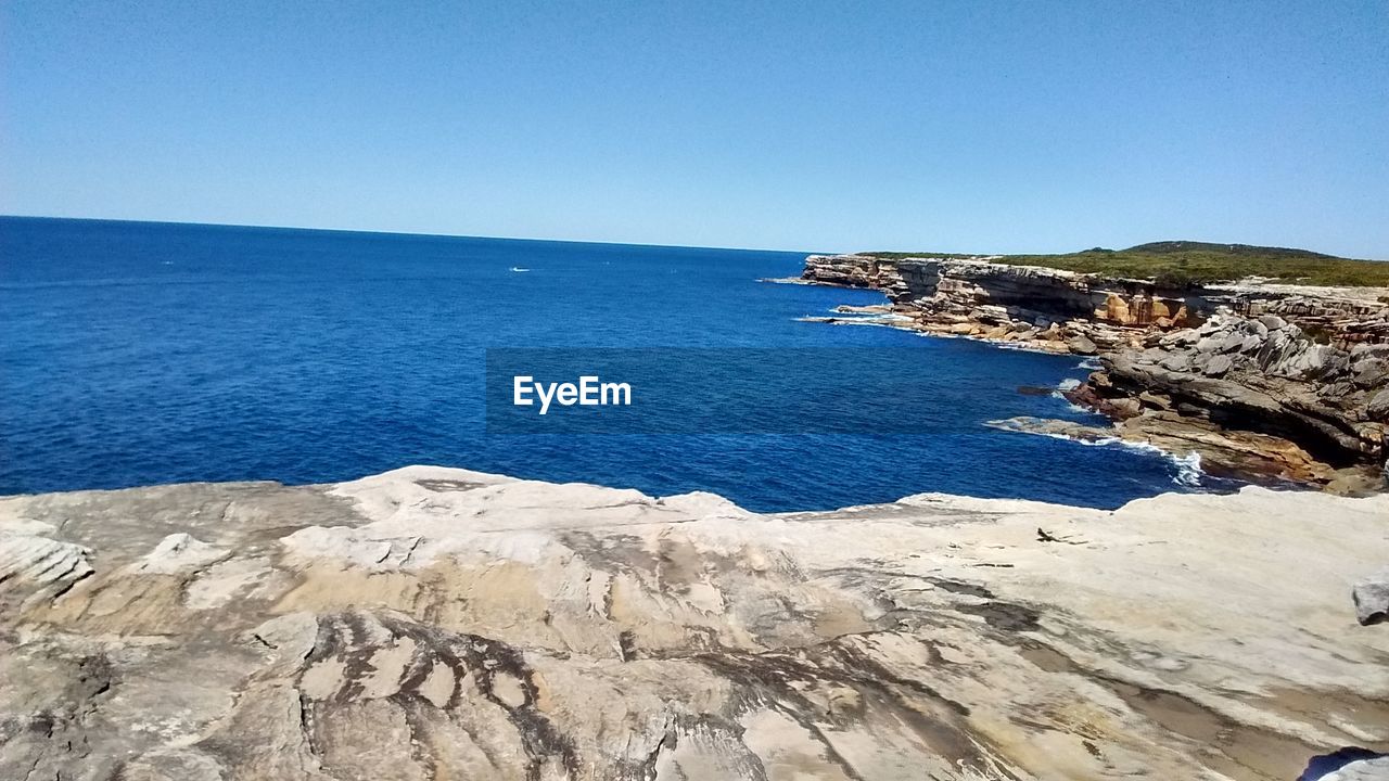 VIEW OF ROCKY COASTLINE