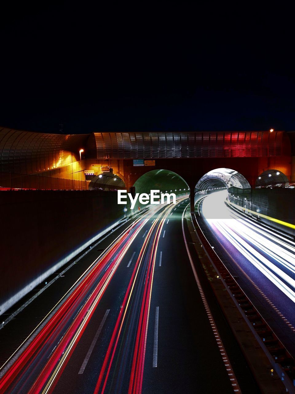 LIGHT TRAILS ON HIGHWAY