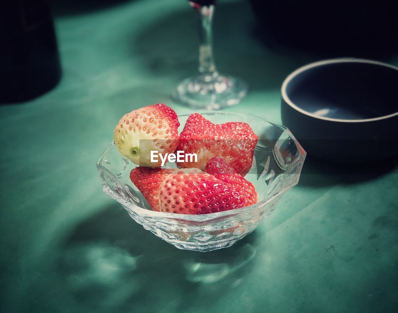 HIGH ANGLE VIEW OF DESSERT WITH STRAWBERRIES ON TABLE