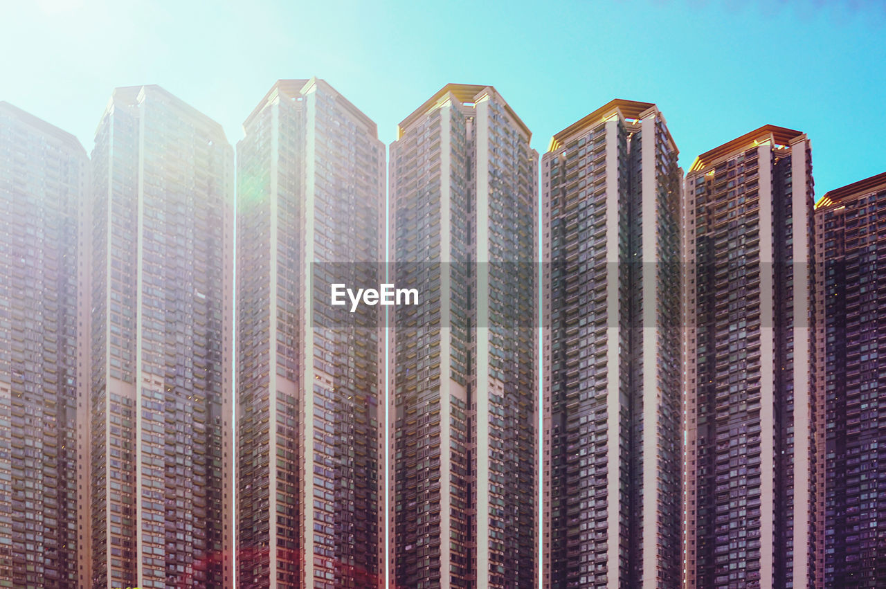 Low angle view of modern buildings against sky