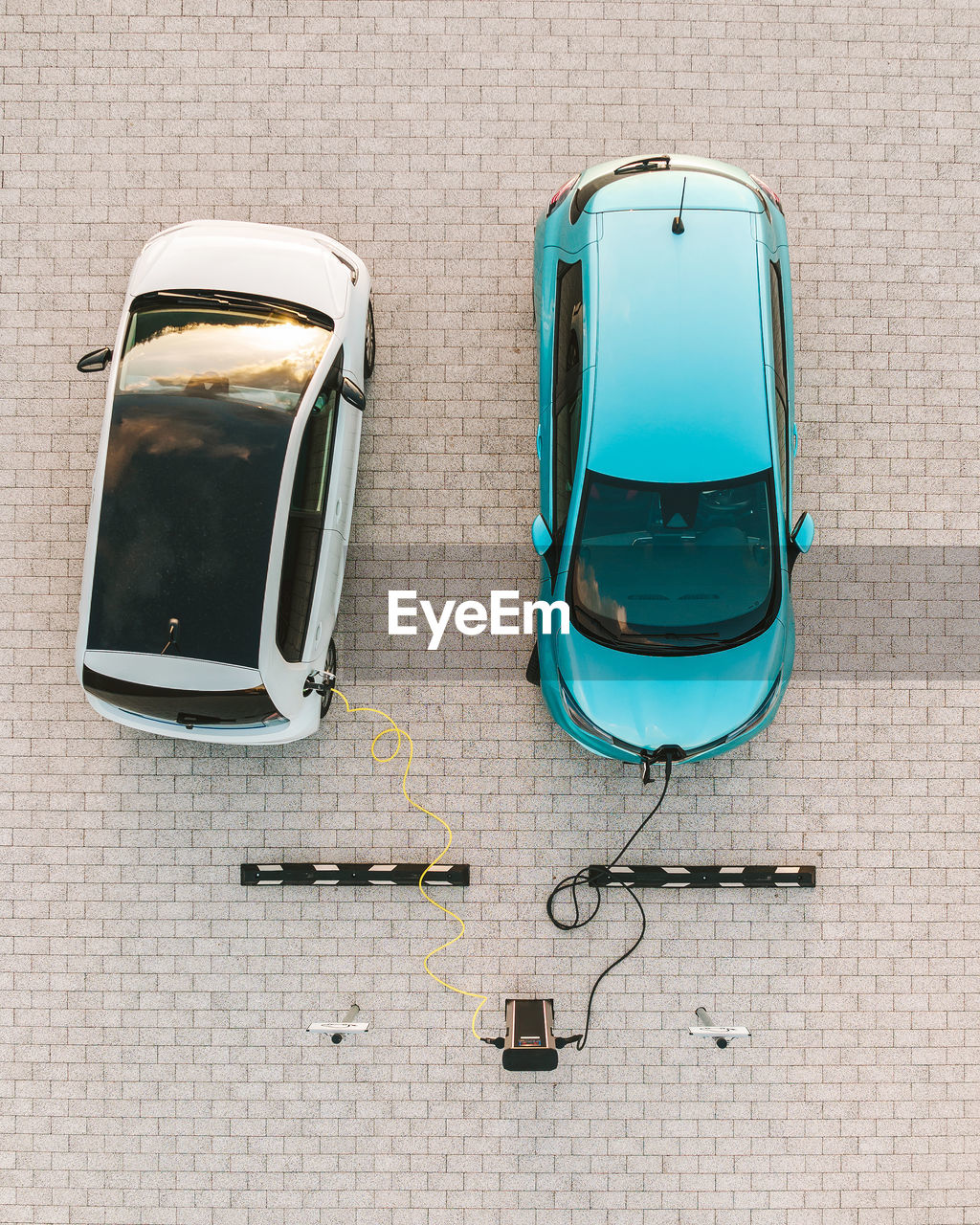 Charging electric cars. top down view