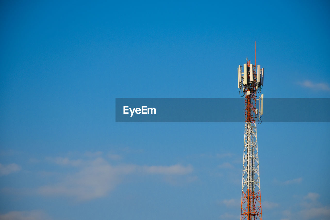 Low angle view of electricity pylon against sky