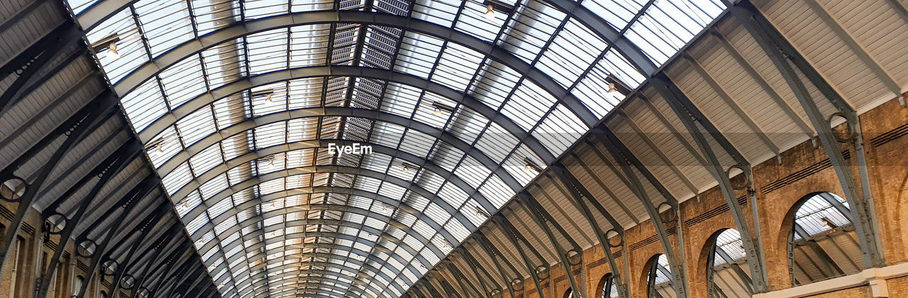 LOW ANGLE VIEW OF SKYLIGHT ON BUILDING