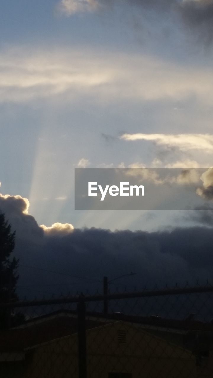 SCENIC VIEW OF MOUNTAIN AGAINST SKY DURING SUNSET