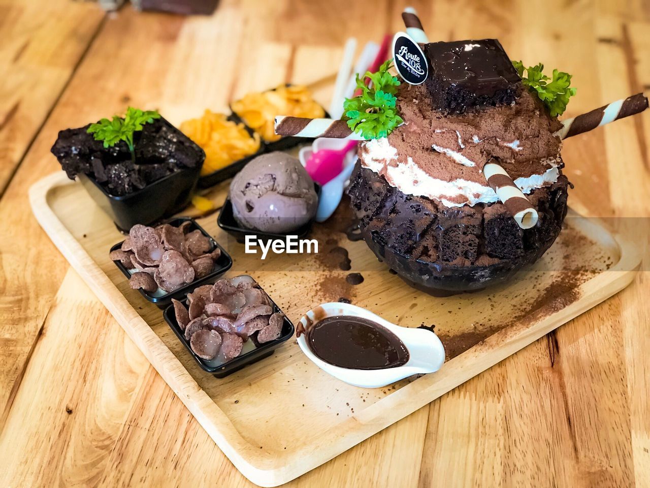 Dessert on cutting board over table