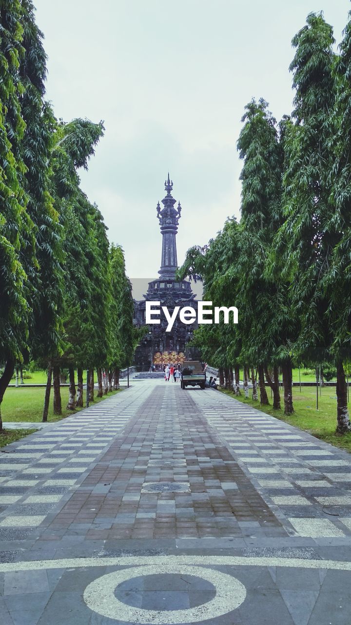 STATUE IN PARK AGAINST SKY