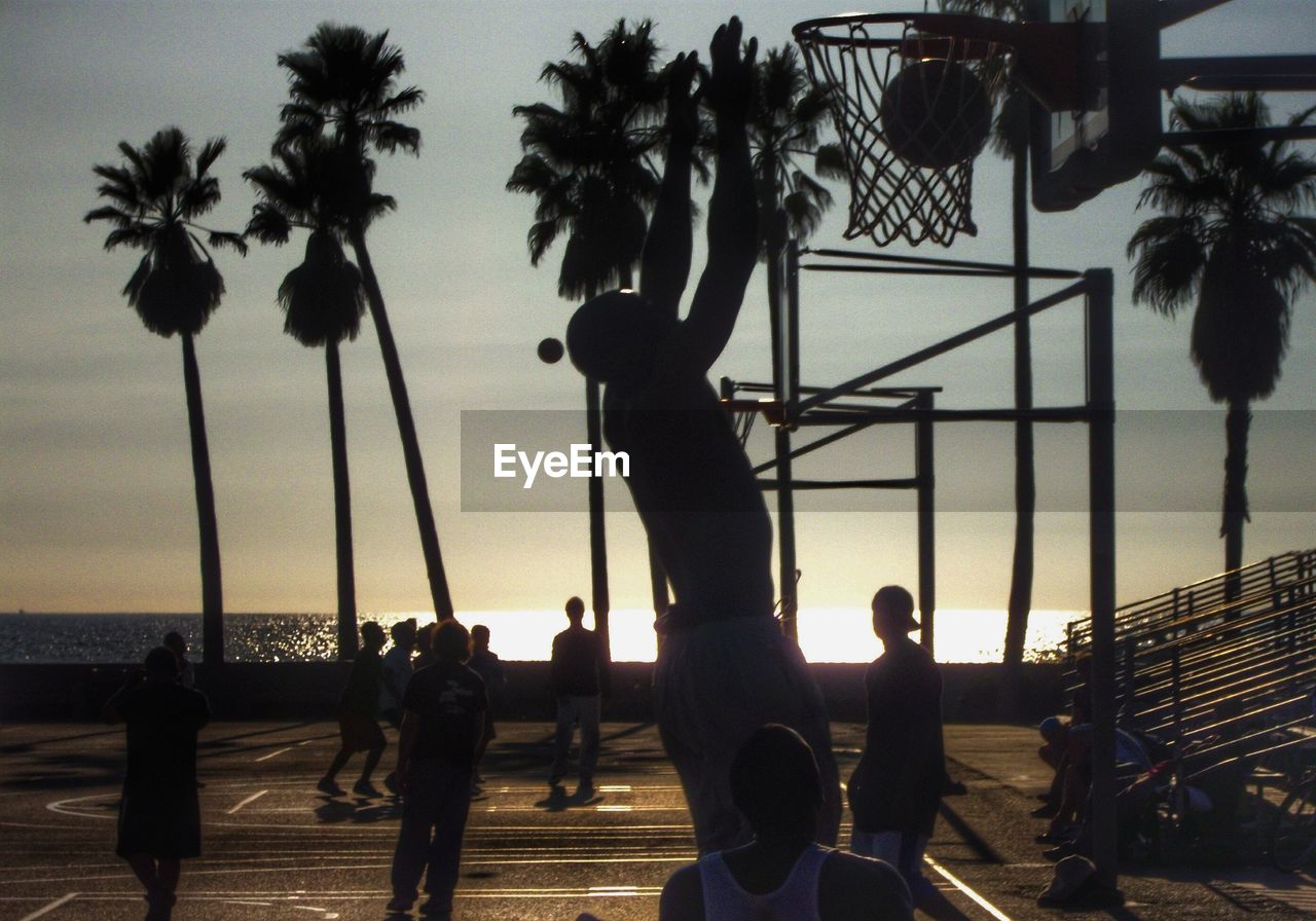 People playing basketball