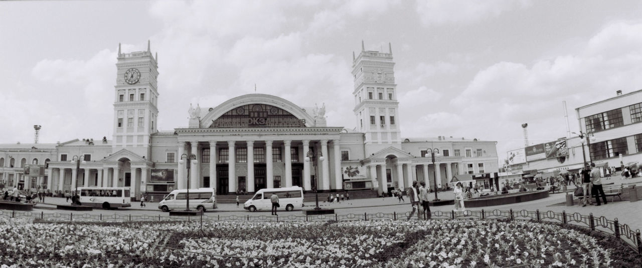 Facade of government building with colonnade and towers