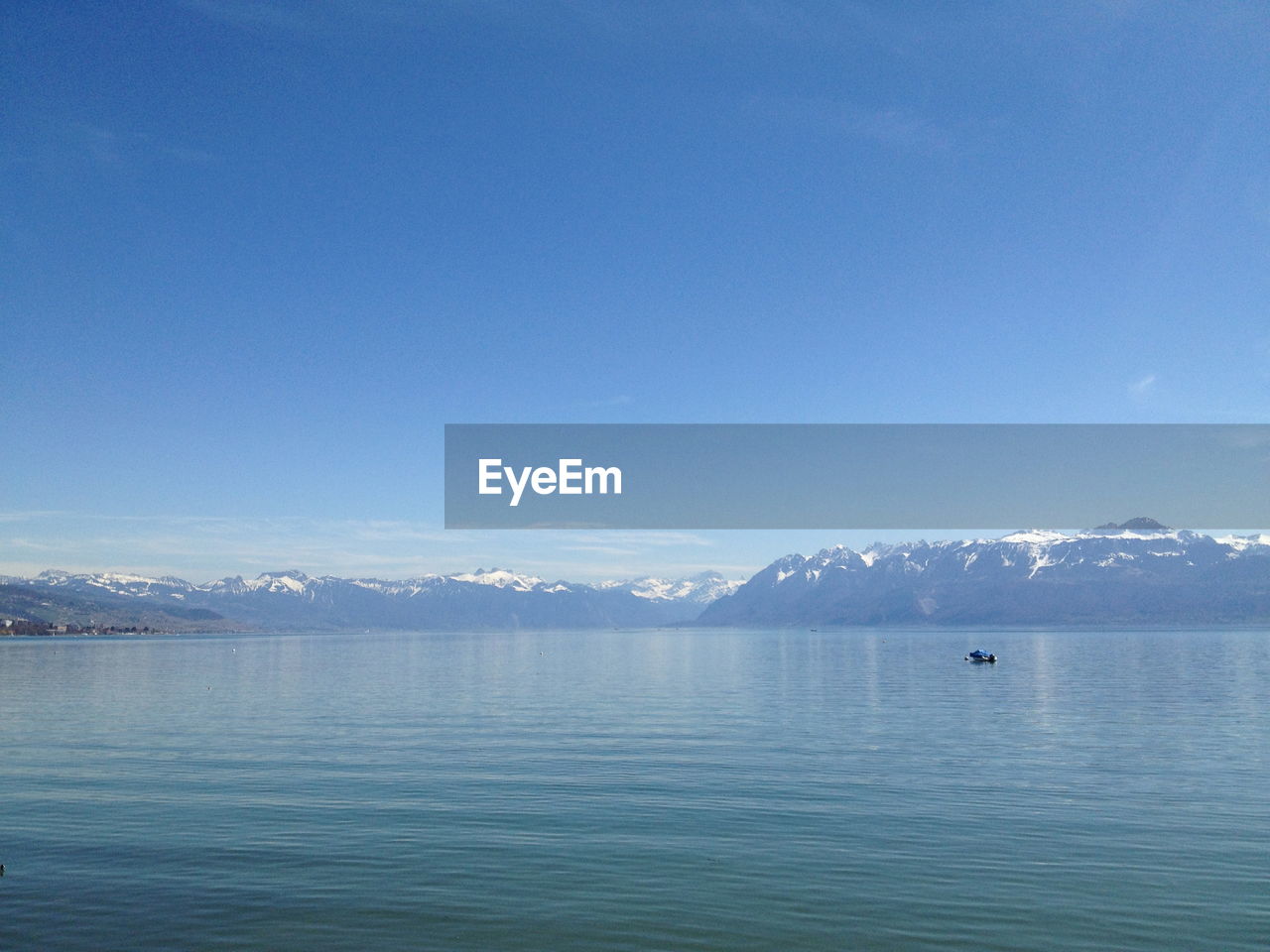 SCENIC VIEW OF SEA AND MOUNTAINS