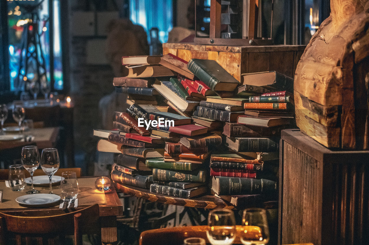 High angle view of books on table at restaurant