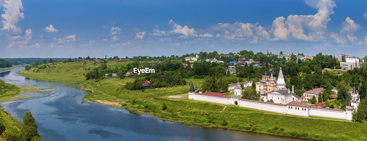 Landscape with volga river and dormition monastery in staritsa, russia