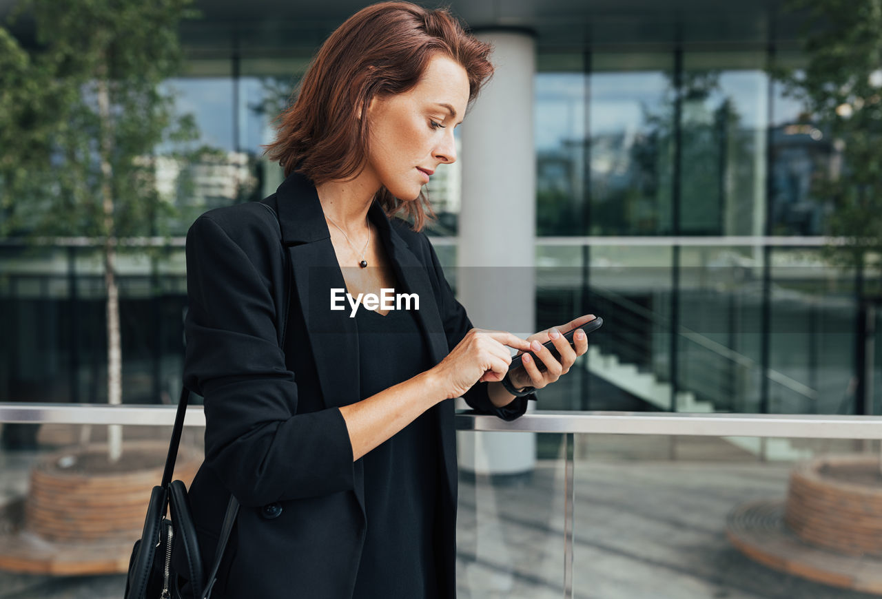 businesswoman using mobile phone