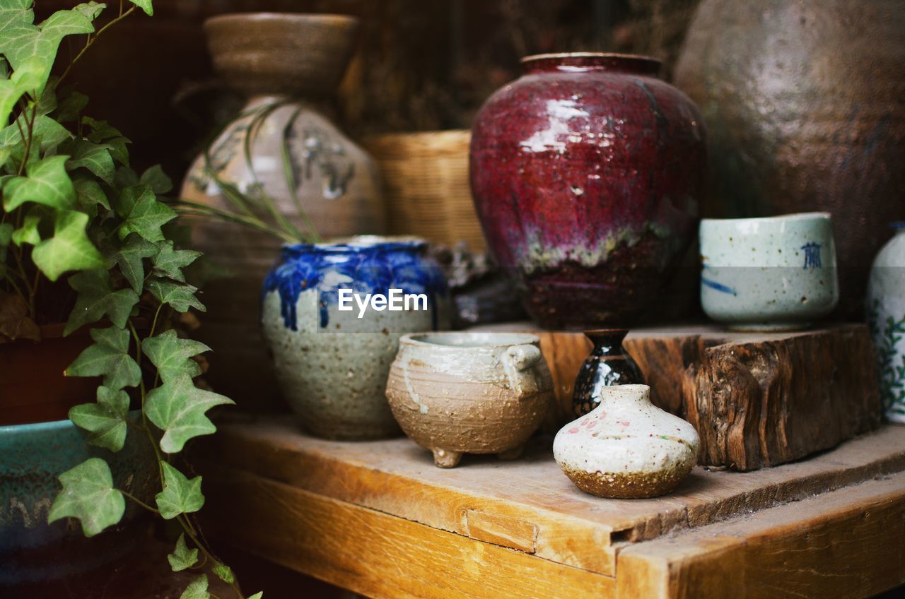 Close-up of earthenware on table