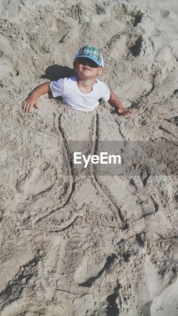 Funny boy at the beach