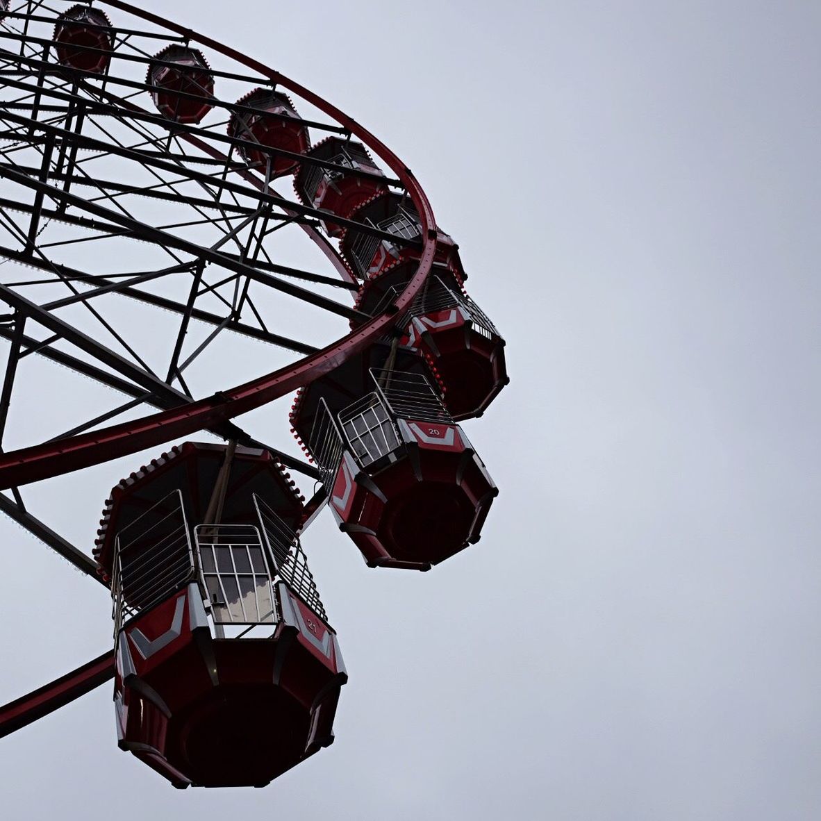 LOW ANGLE VIEW OF AMUSEMENT PARK AGAINST SKY