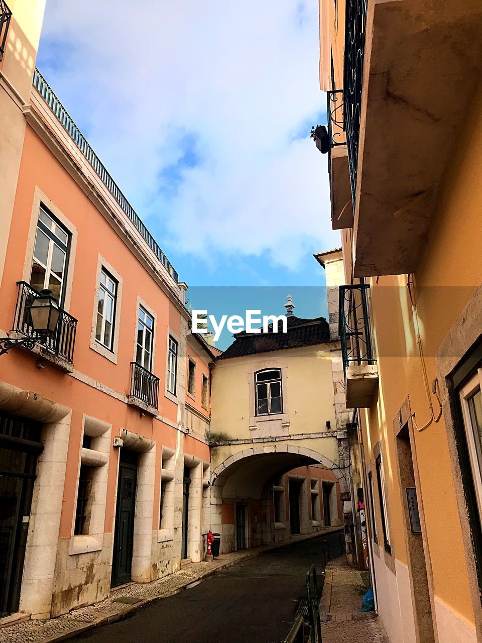 Low angle view of buildings in city against sky