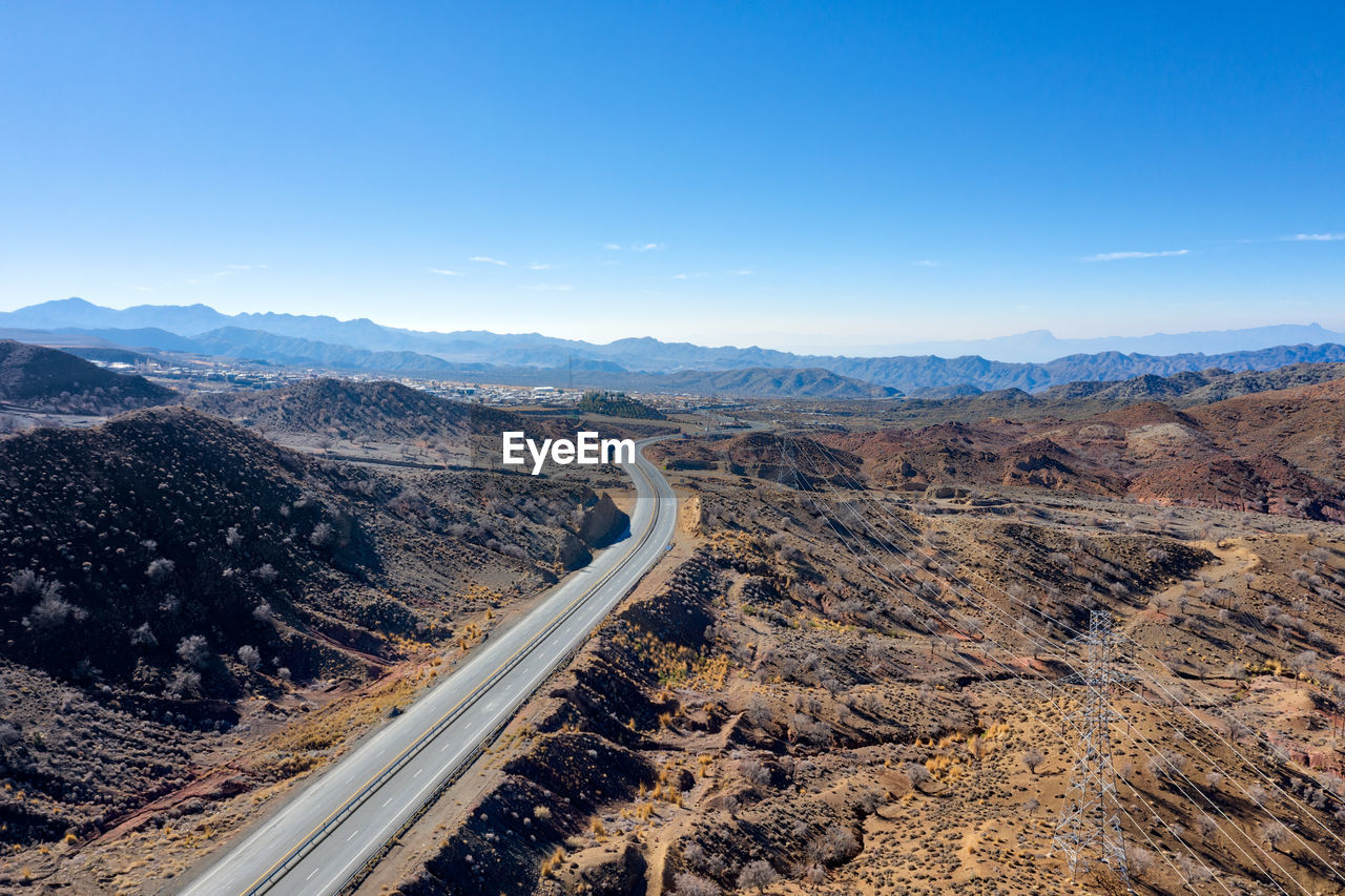 High angle view of road amidst landscape against sky