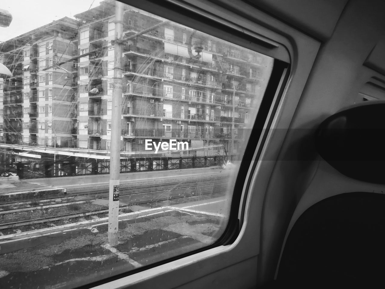 CLOSE-UP OF BUS WINDOW