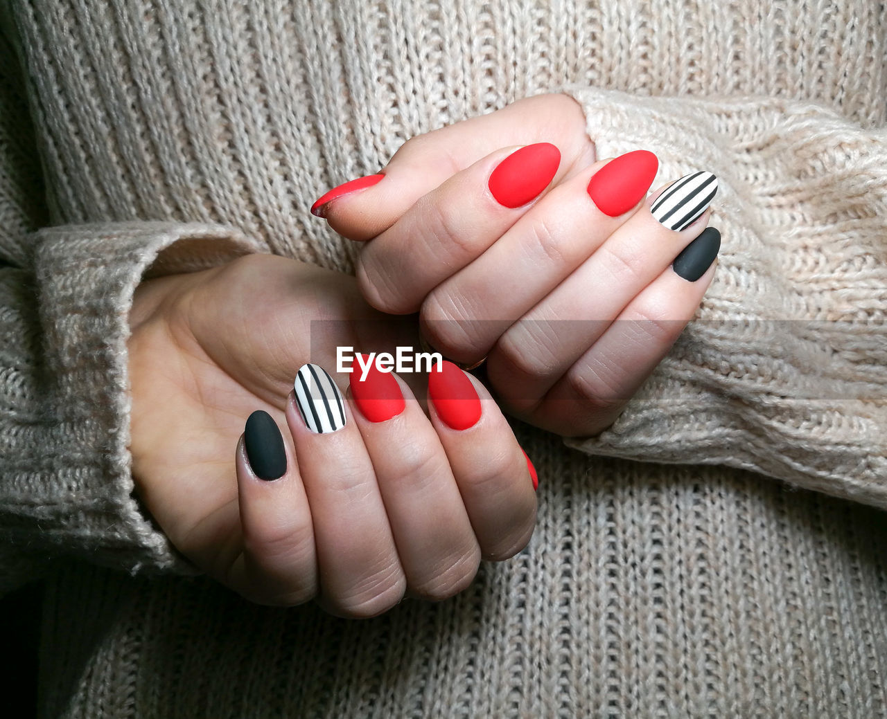 Cropped hand on woman with nail polish