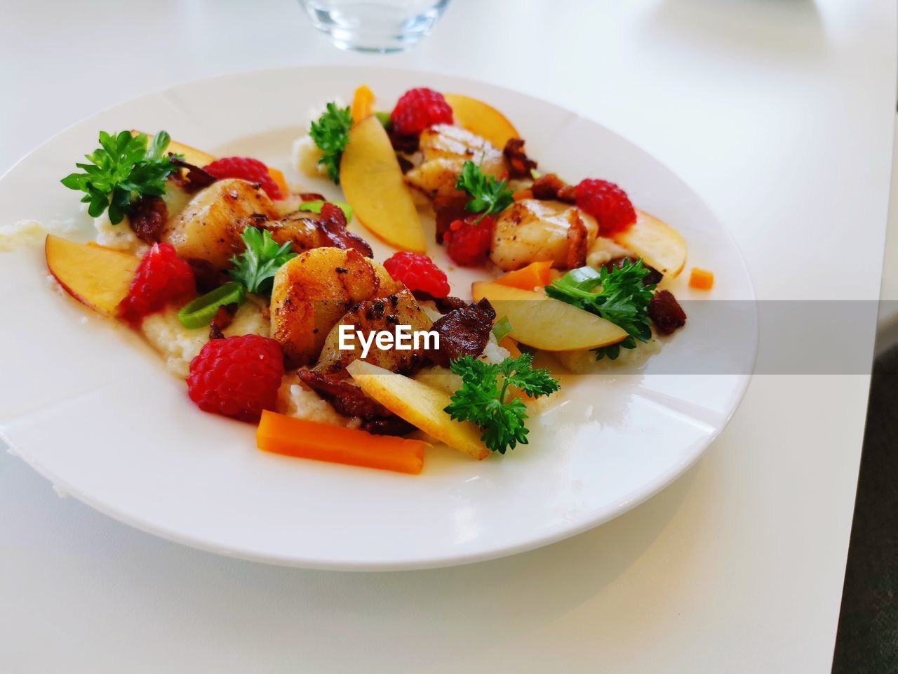 food and drink, food, healthy eating, fruit, plate, vegetable, wellbeing, dish, meal, freshness, salad, produce, cuisine, strawberry, no people, table, indoors, lunch, berry, high angle view, tomato, breakfast, drink, green, dinner, refreshment, herb