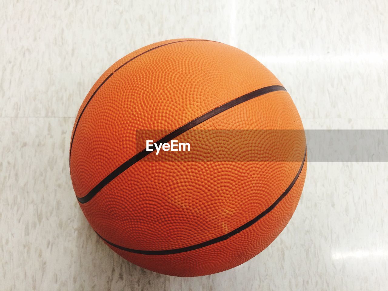Close-up of basketball on floor