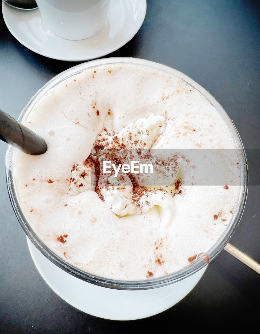 food and drink, food, kitchen utensil, dish, drink, coffee, cup, eating utensil, dessert, mug, spoon, coffee cup, high angle view, sweet food, indoors, refreshment, table, crockery, no people, sweet, breakfast, hot drink, meal, cappuccino, freshness, dairy, still life, saucer