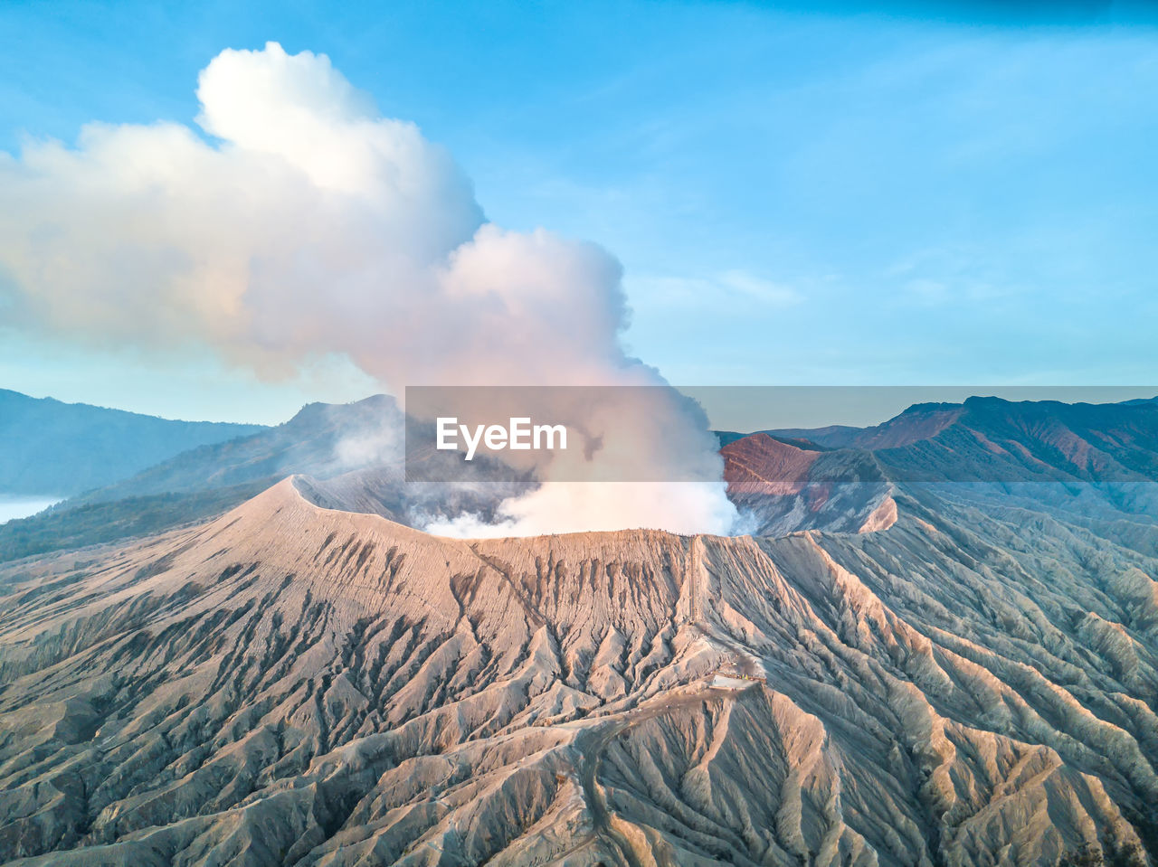 SMOKE EMITTING FROM VOLCANIC LANDSCAPE