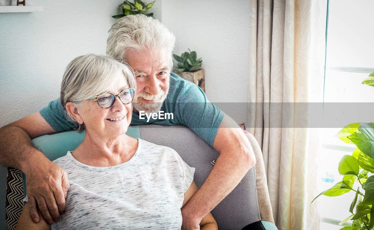 Smiling senior couple at home