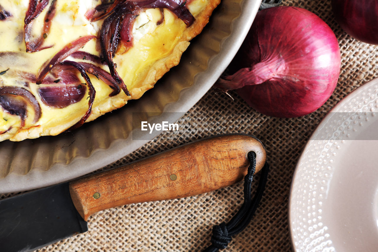 Tarte flambee - a traditional french onion pie homemade on a cold day