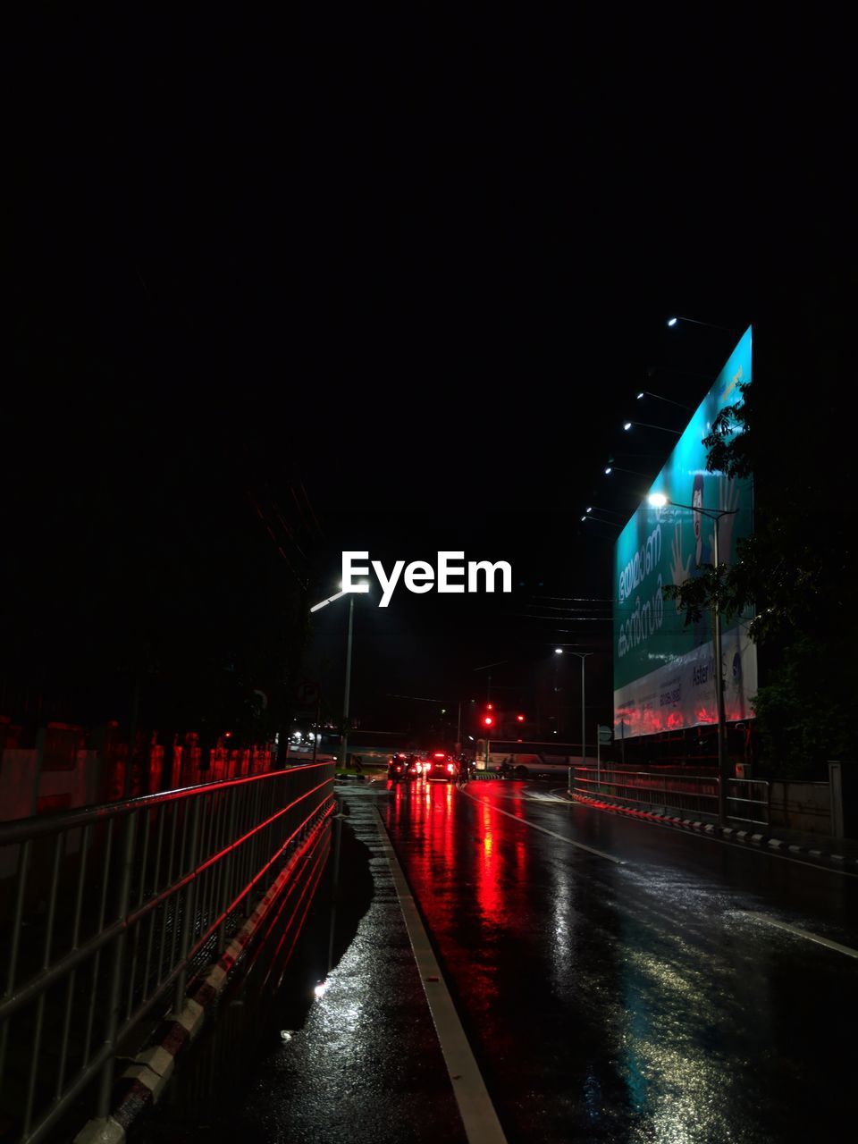 ILLUMINATED STREET AT NIGHT