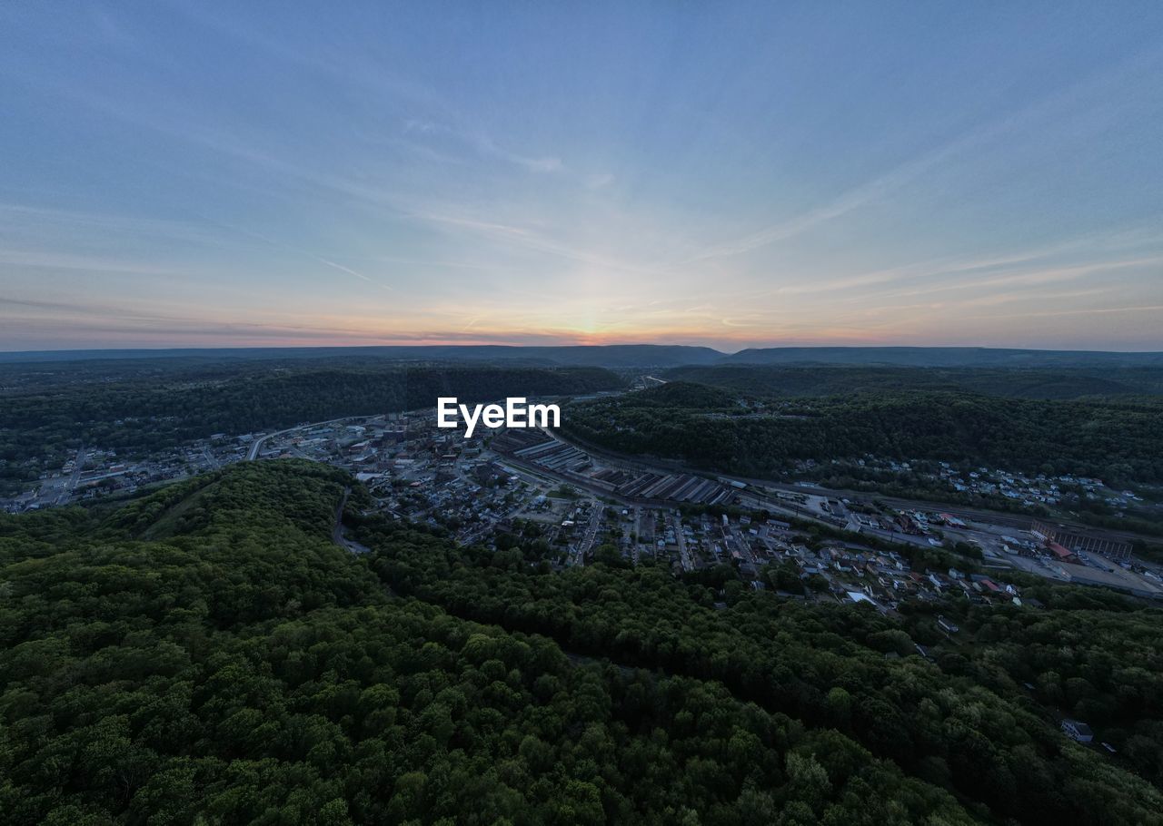 High angle view of buildings against sky during sunset