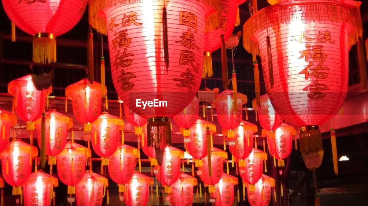 RED LANTERNS HANGING IN TEMPLE