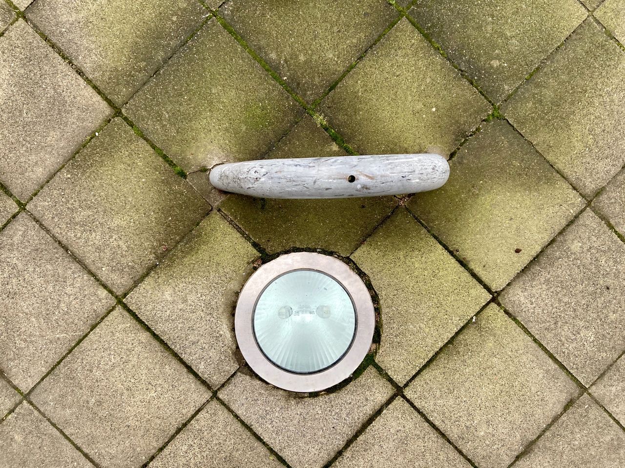 HIGH ANGLE VIEW OF COFFEE ON TILED FLOOR