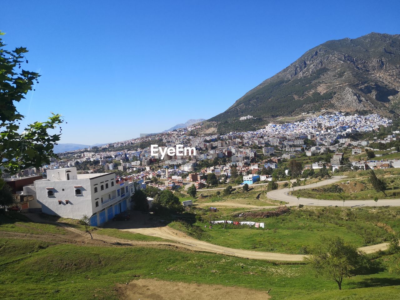 Aerial view of townscape against sky