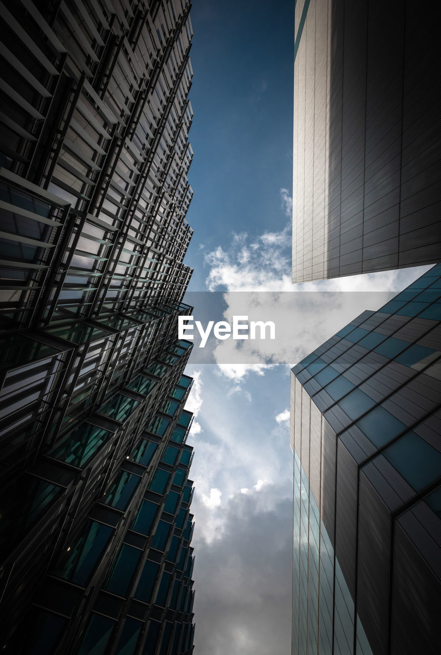 Low angle view of modern buildings against sky